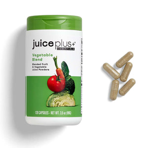 Juice Plus+ Vegetable Blend supplement container with capsules on a white background